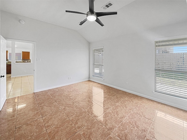 unfurnished room with visible vents, baseboards, light tile patterned floors, lofted ceiling, and ceiling fan