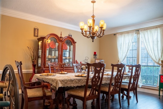 dining room featuring plenty of natural light and ornamental molding