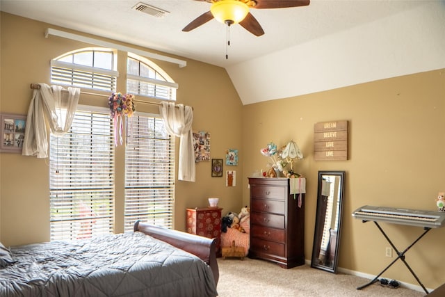 bedroom featuring visible vents, ceiling fan, baseboards, carpet, and vaulted ceiling