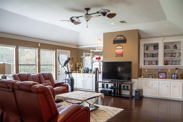 living area featuring visible vents, a ceiling fan, dark wood finished floors, recessed lighting, and vaulted ceiling