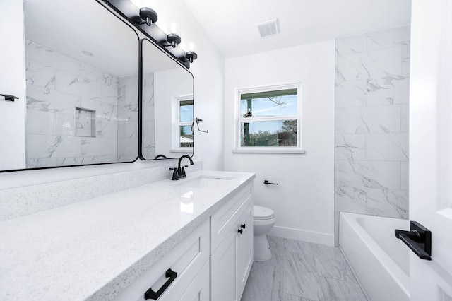 bathroom featuring vanity, baseboards, visible vents, toilet, and marble finish floor