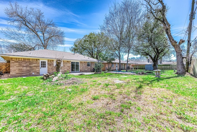 view of yard with a patio and a fenced backyard