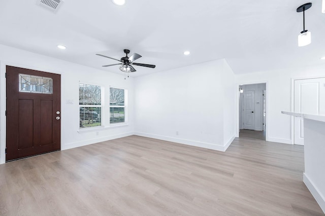 foyer entrance with light wood-style flooring, recessed lighting, baseboards, and visible vents