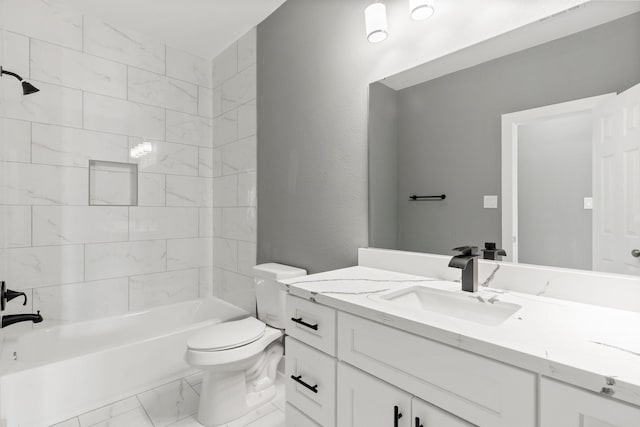 bathroom featuring vanity, shower / bathing tub combination, toilet, and marble finish floor