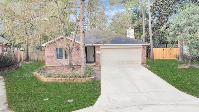 single story home with fence, concrete driveway, a front lawn, a garage, and brick siding