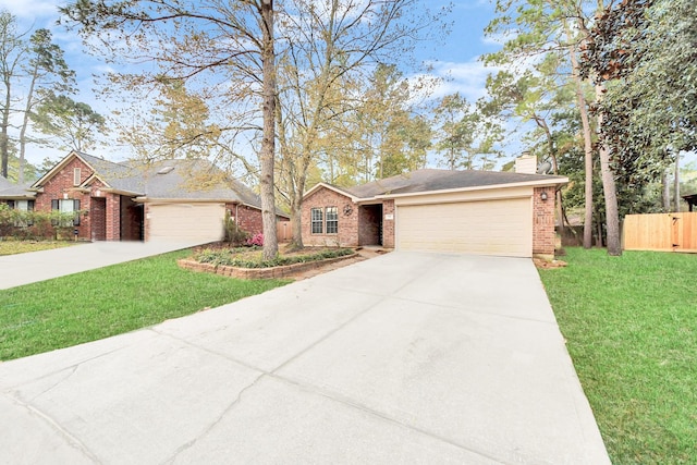 single story home featuring brick siding, an attached garage, concrete driveway, and fence