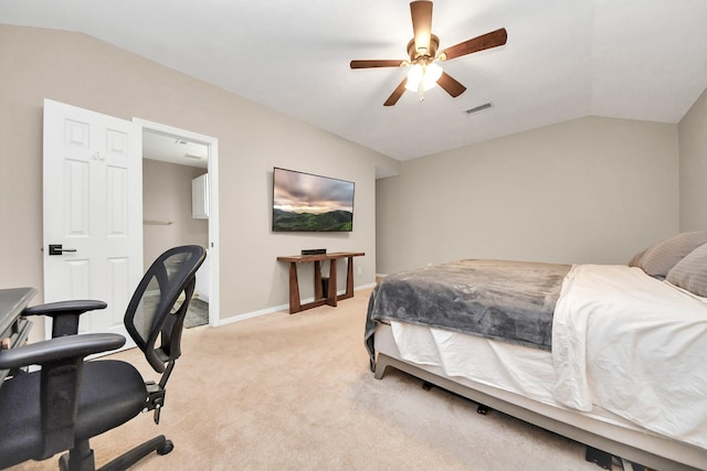 bedroom with vaulted ceiling, baseboards, visible vents, and light carpet