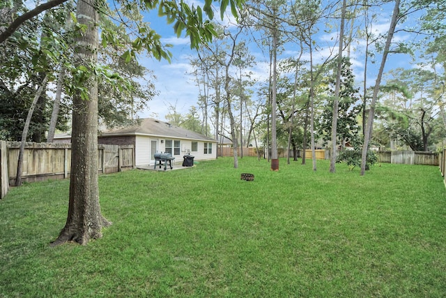 view of yard featuring a fenced backyard