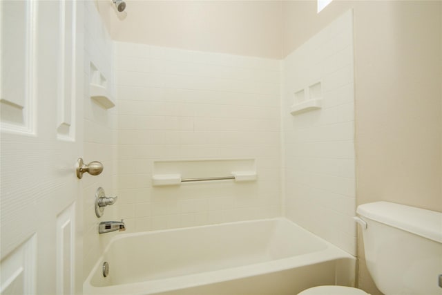 bathroom with toilet and shower / bathtub combination