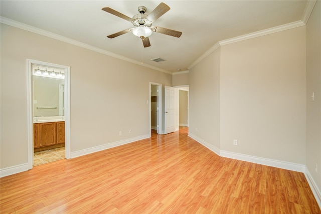 unfurnished bedroom with visible vents, baseboards, and light wood-style flooring