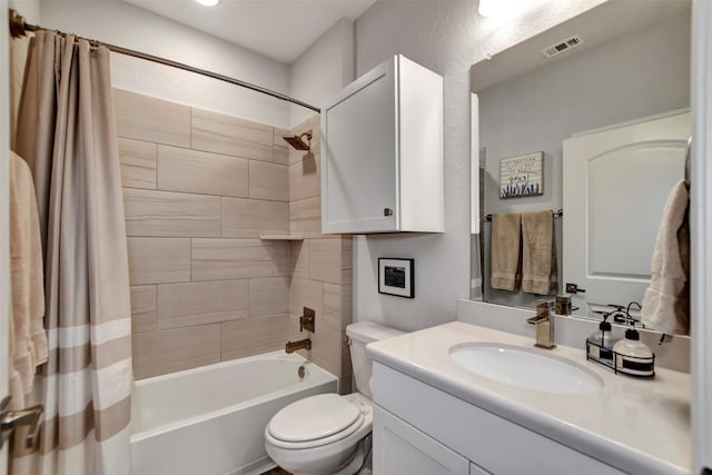 full bathroom with vanity, shower / bath combination with curtain, toilet, and visible vents