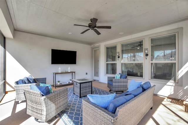 view of patio with a ceiling fan and outdoor lounge area