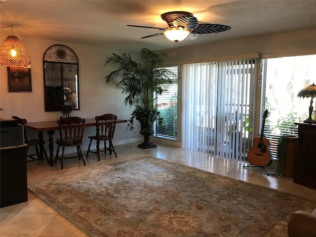 interior space with a ceiling fan