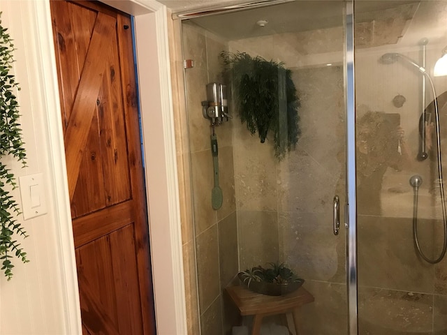 bathroom featuring a stall shower