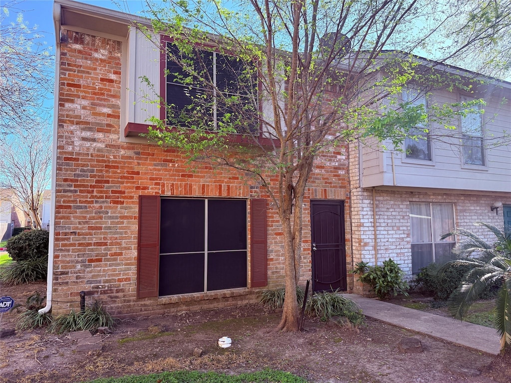 9279 Westwood Village Dr Unit 42, Houston, TX 77036 - view of front facade with brick siding