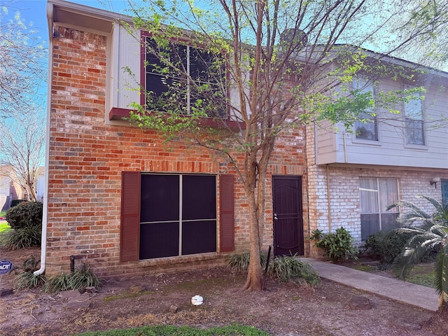 9279 Westwood Village Dr Unit 42, Houston, TX 77036 - view of front facade with brick siding
