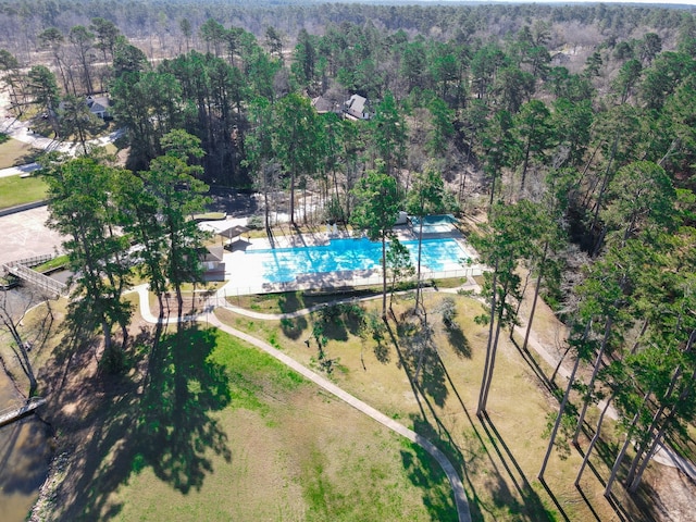 bird's eye view featuring a forest view