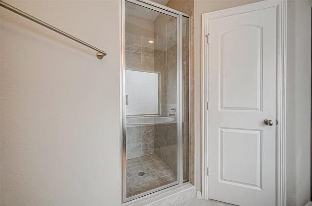 full bathroom with a shower stall