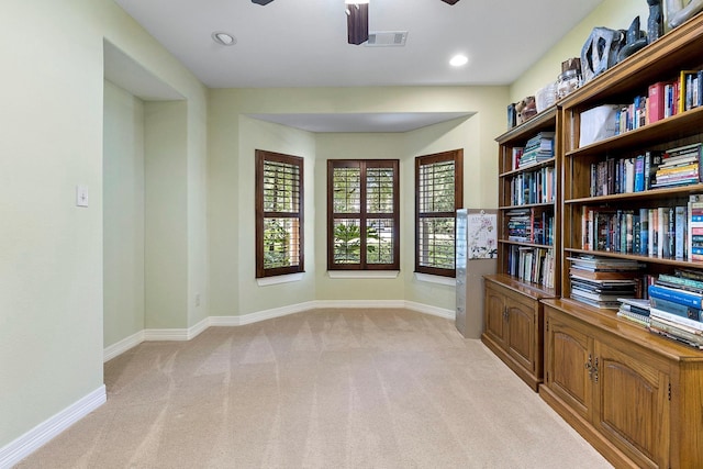 interior space featuring visible vents, baseboards, light colored carpet, recessed lighting, and a ceiling fan