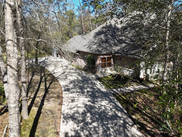 view of home's exterior featuring brick siding