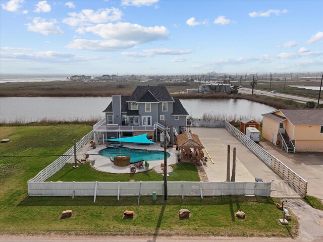 birds eye view of property featuring a water view