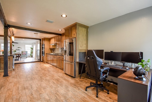 office featuring light wood finished floors, beamed ceiling, recessed lighting, and visible vents