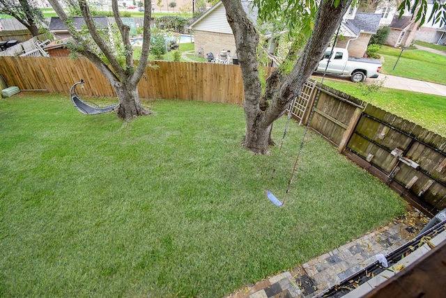 view of yard featuring fence