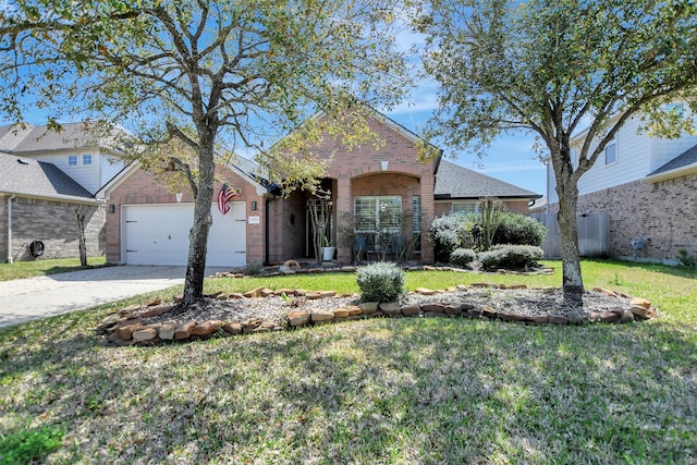 view of front of property featuring brick siding, an attached garage, concrete driveway, and a front yard