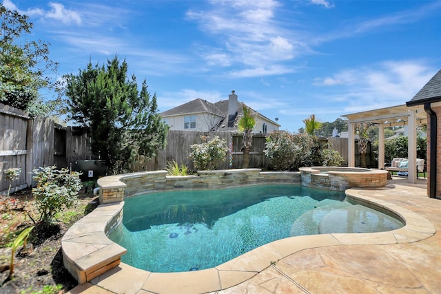 view of swimming pool featuring a pool with connected hot tub, a fenced backyard, and a patio area