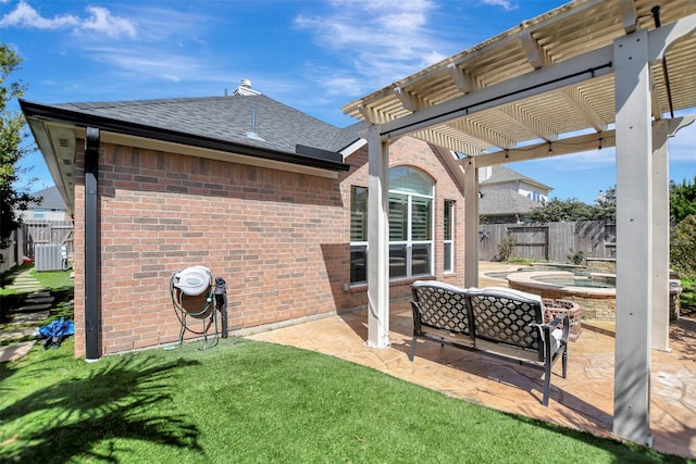 exterior space with a patio, fence, an in ground hot tub, a pergola, and brick siding