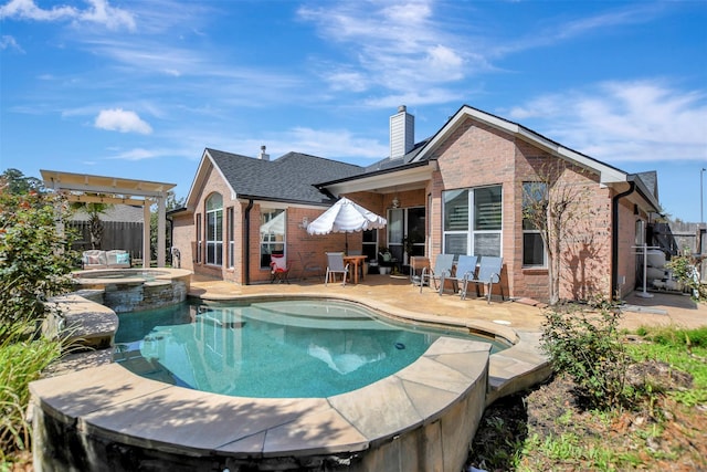 exterior space with brick siding, an in ground hot tub, a fenced backyard, and a patio area