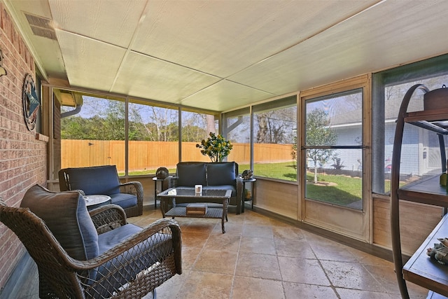 sunroom / solarium featuring visible vents