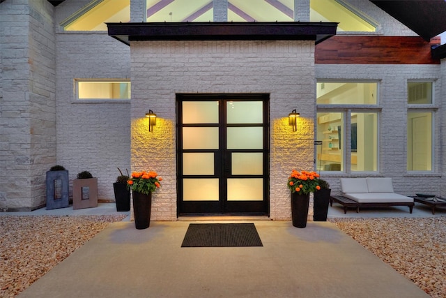 property entrance featuring french doors