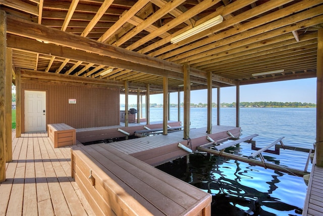 view of dock with a water view and boat lift