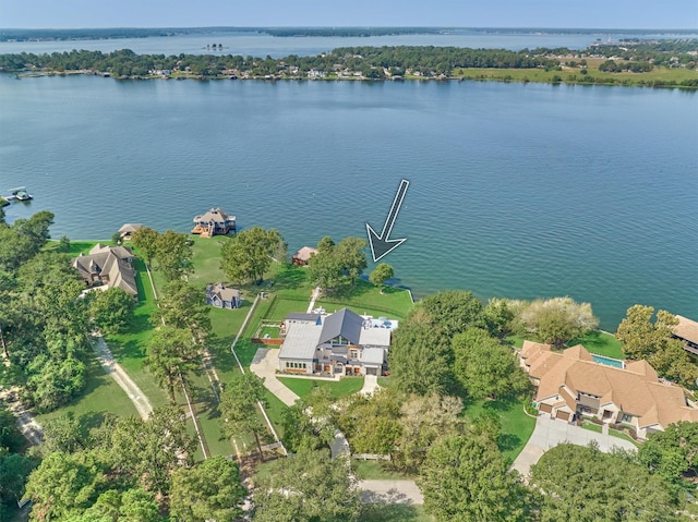 birds eye view of property with a residential view and a water view