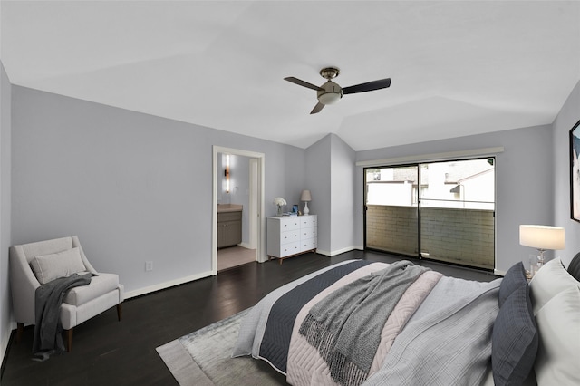 bedroom featuring baseboards, dark wood finished floors, ceiling fan, vaulted ceiling, and connected bathroom