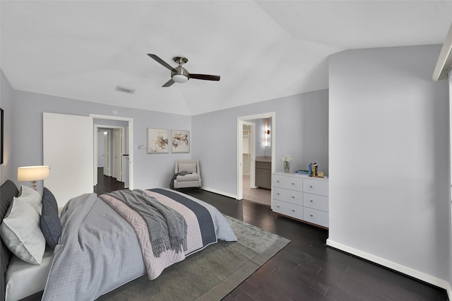 bedroom featuring visible vents, dark wood finished floors, baseboards, lofted ceiling, and ceiling fan