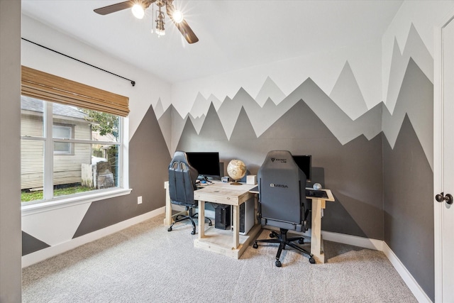 office area featuring baseboards, a ceiling fan, and carpet flooring