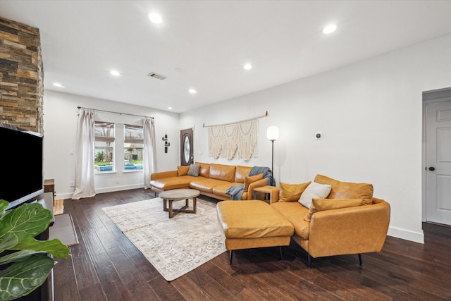 living room with recessed lighting, visible vents, baseboards, and dark wood-style floors