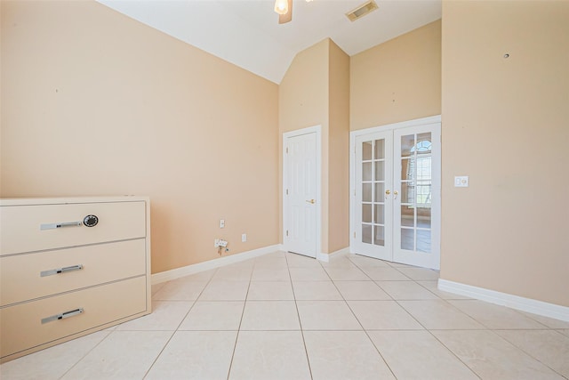 spare room featuring light tile patterned floors, french doors, baseboards, and visible vents