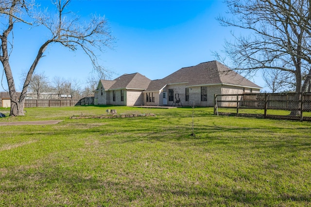 view of yard with fence