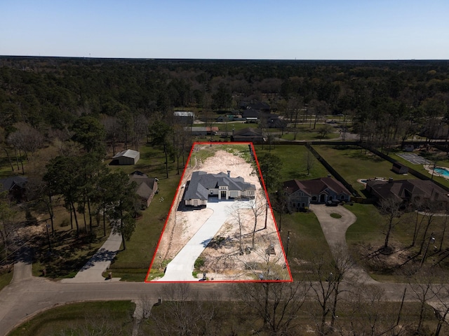 drone / aerial view with a forest view