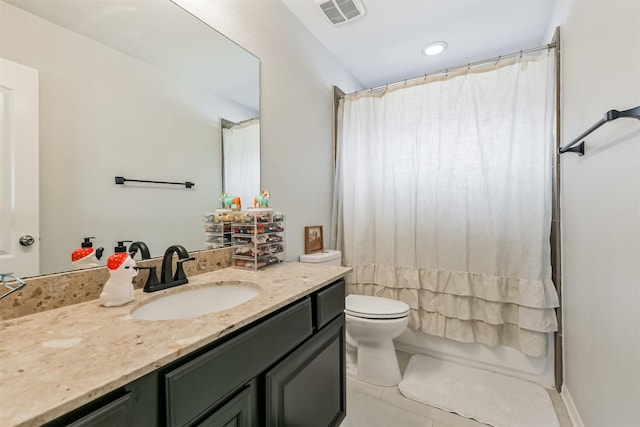 full bath featuring vanity, toilet, shower / bath combo, and visible vents