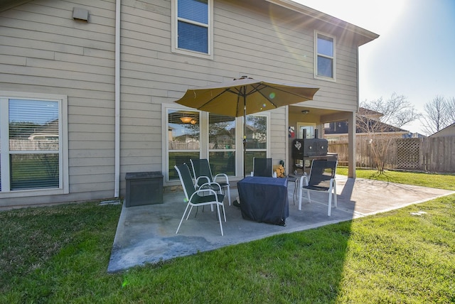 view of patio / terrace featuring fence