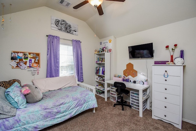 carpeted bedroom featuring visible vents, lofted ceiling, and a ceiling fan