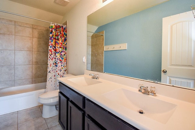 full bath featuring a sink, toilet, shower / bath combination with curtain, and tile patterned flooring