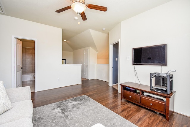 living area featuring visible vents, lofted ceiling, ceiling fan, and wood finished floors