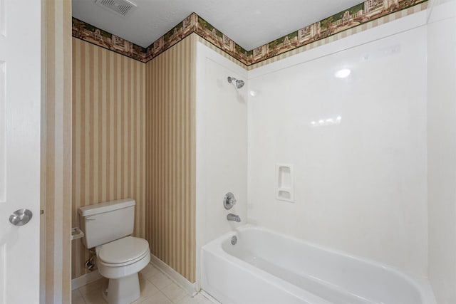 full bathroom with tile patterned floors, visible vents, wallpapered walls, and toilet