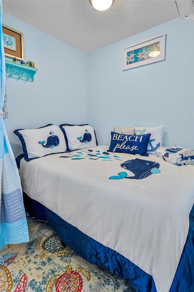 bedroom with a textured ceiling