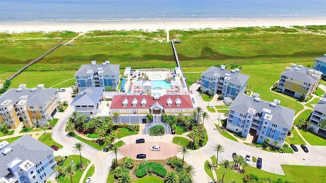 bird's eye view with a view of the beach and a water view